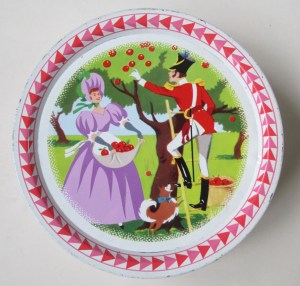 The Quality Street Soldier & Lady pick apples in the orchard