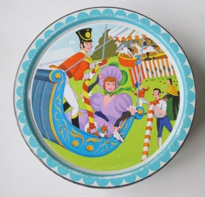 The Quality Street Soldier & Lady in a swingboat at the fair