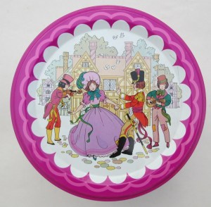 The Quality Street Soldier & Lady being entertained by street musicians