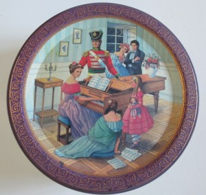 The Quality Street Soldier admires the Lady playing the piano