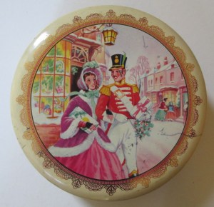 A classic 1950s Christmas image of the Quality Street Soldier & Lady