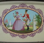 The Quality Street Soldier & Lady gather flowers