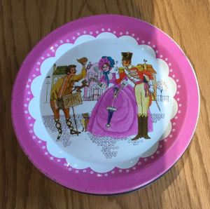 The Quality Street Soldier & Lady are entertained by a dancing monkey