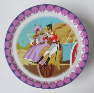 The Quality Street Soldier & Lady travel on a haywain