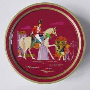 The Quality Street Soldier & Lady ina maroon setting
