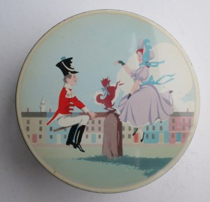 The Quality Street child Soldier & Lady on a seesaw