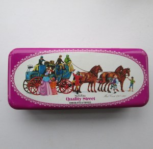 The Quality Street Soldier departs in a mail coach