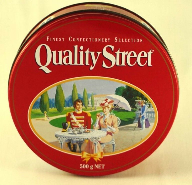 The Australian Quality Street Soldier & Lady enjoy tea and cake