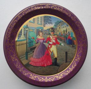 The Quality Street Lady sporting a large green fan